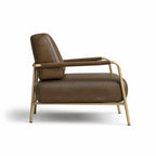 Pure® Sinclair Leather Chair featuring warm brown Italian-tanned buffalo leather and a refined brass frame.