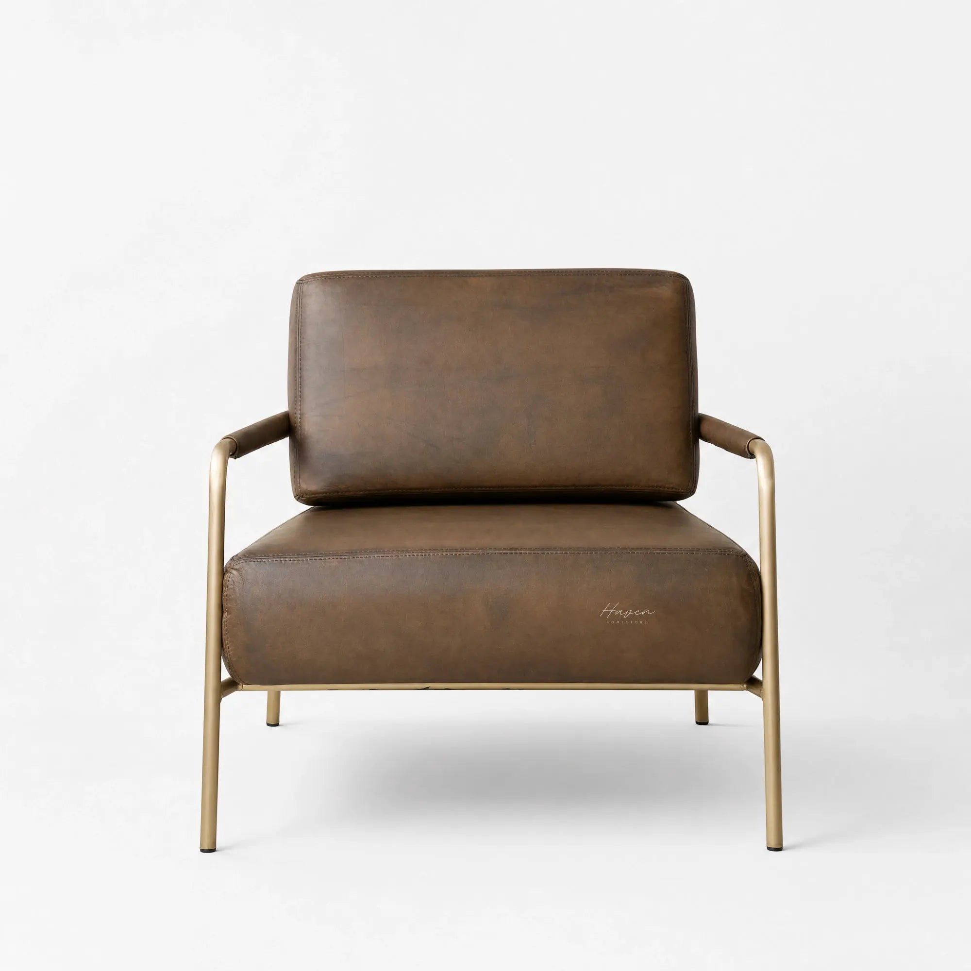 Pure Sinclair Leather Chair in Italian-tanned buffalo leather with a refined brass frame.