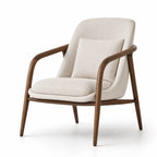 Lund Armchair in solid ash wood with cream polyester upholstery and a plush cushion, Scandinavian design.