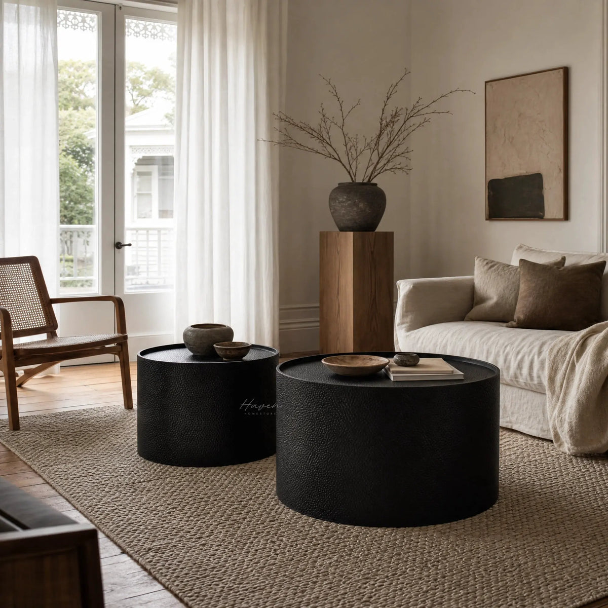 Daven Coffee Table Set/2: Nordic-inspired iron nesting tables in a minimalist living room.