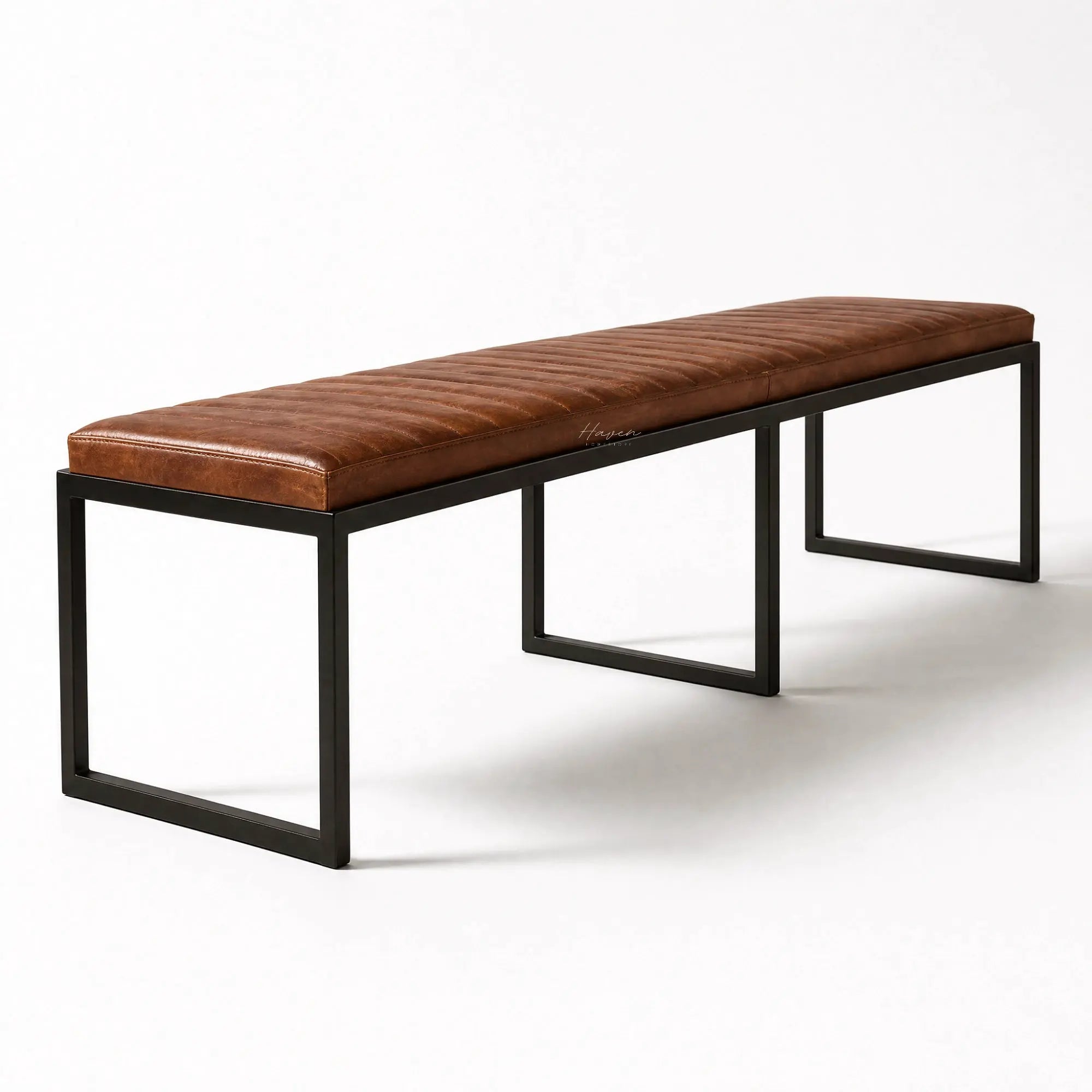Pure® Sabina Bench with tufted buffalo leather cushion and slim matte black metal frame