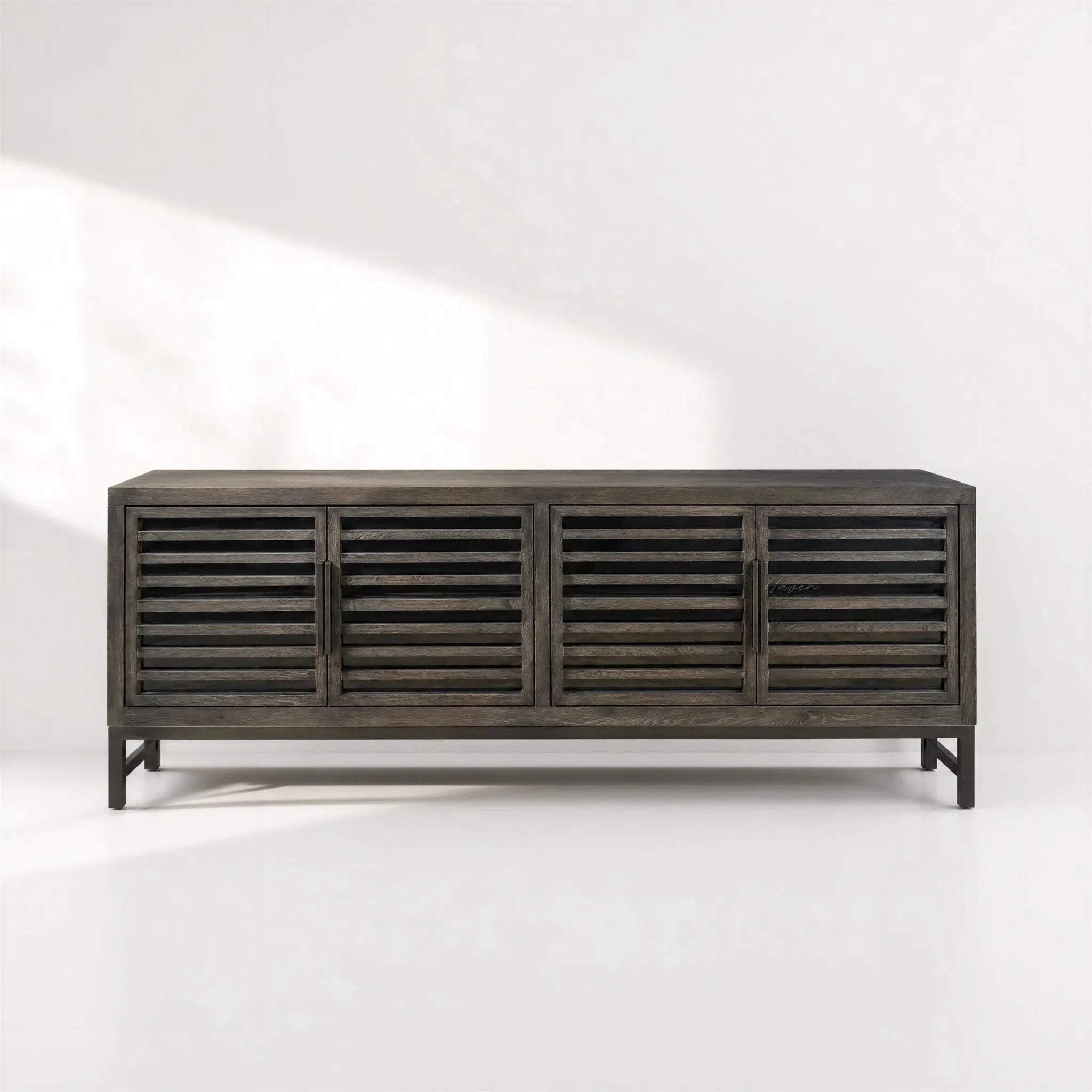 Kuro Slatted Sideboard in ebony-washed oak with slatted doors, architectural warmth and clean lines.