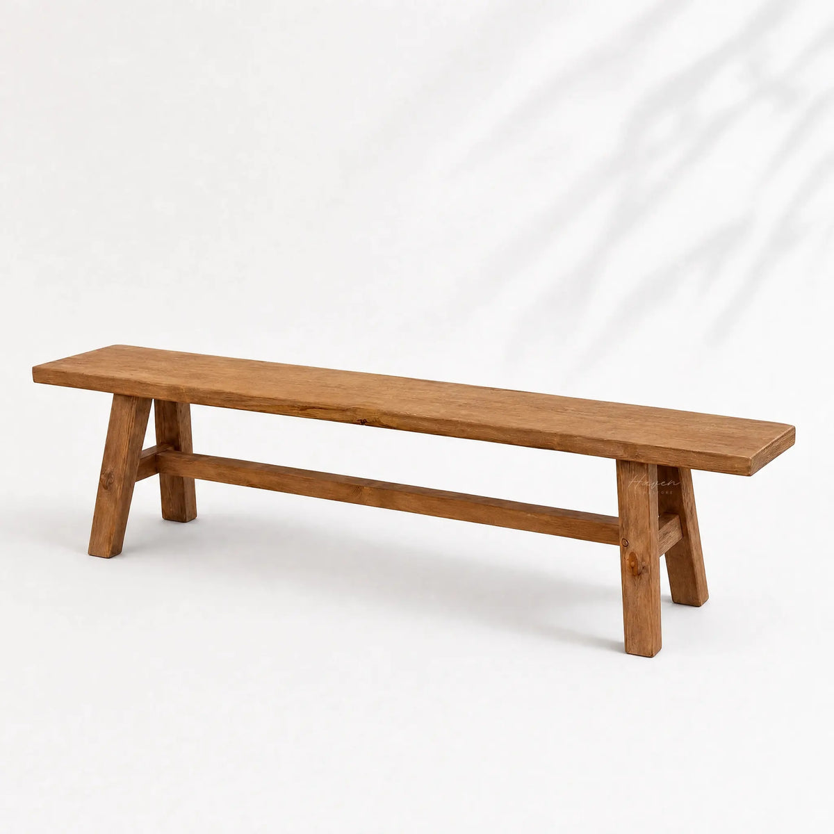 Reclaimed elm bench, 160cm wide, solid and grounded with unique grain and markings.