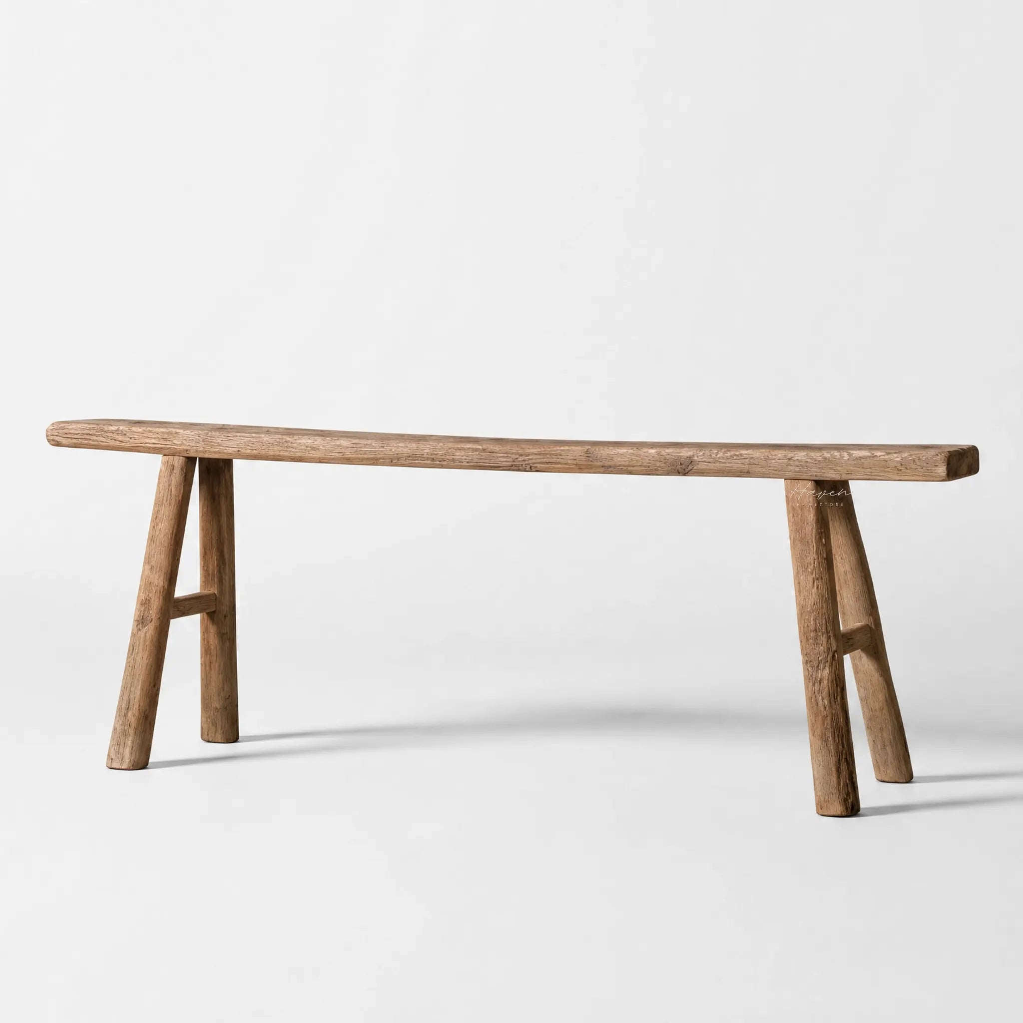 Workshop Elm Bench in solid elm with a timeworn finish, rustic warmth for dining or entryway.