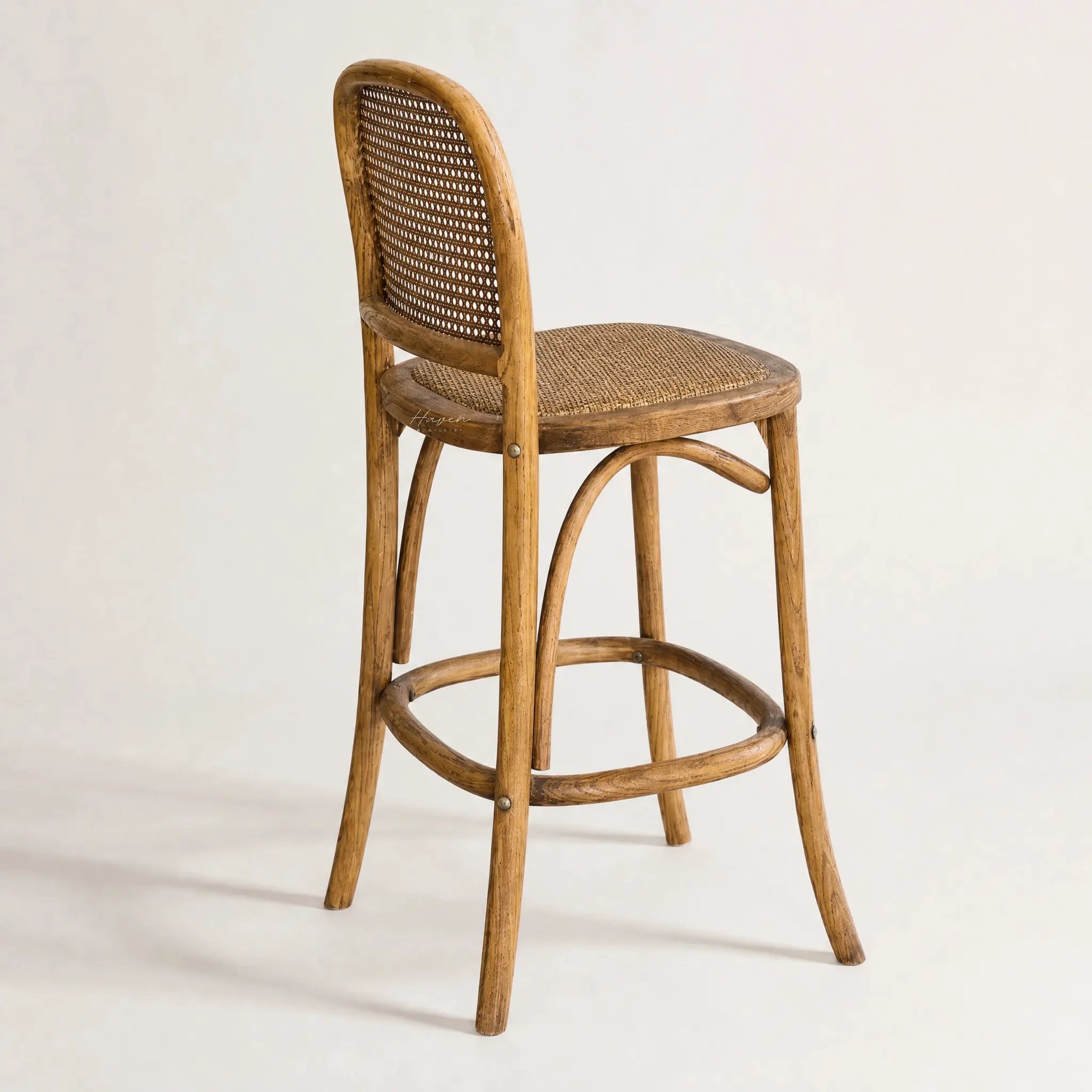 Margaux Stool: solid oak frame, woven natural rattan back and seat, 65cm counter height.