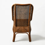Albany Chair with handwoven natural rattan lattice back and curved wooden frame.