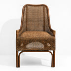 Albany Chair with handwoven natural rattan, curved silhouette, and warm textured appeal.