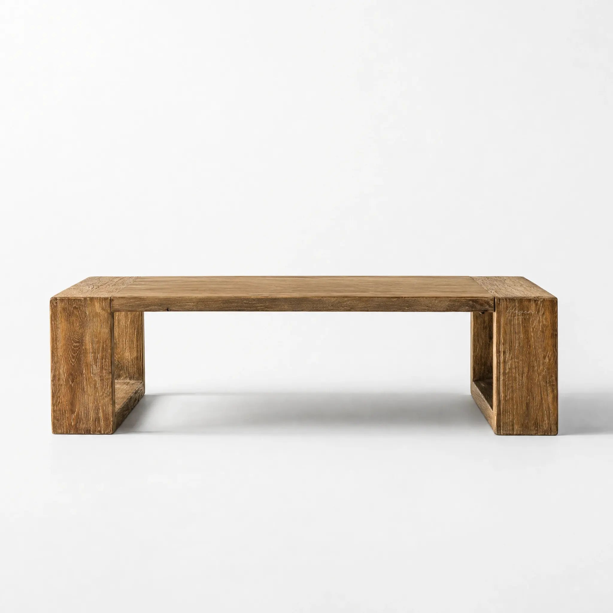Casa Coffee Table, reclaimed elm with aged black finish, bold block legs, natural grain, timeworn texture.
