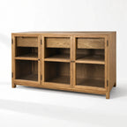 Baxter Oak Sideboard in warm oak veneer with glass-front doors and ample storage.