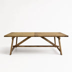 Briar Elm Dining Table in warm reclaimed elm with farmhouse charm and X-frame supports.