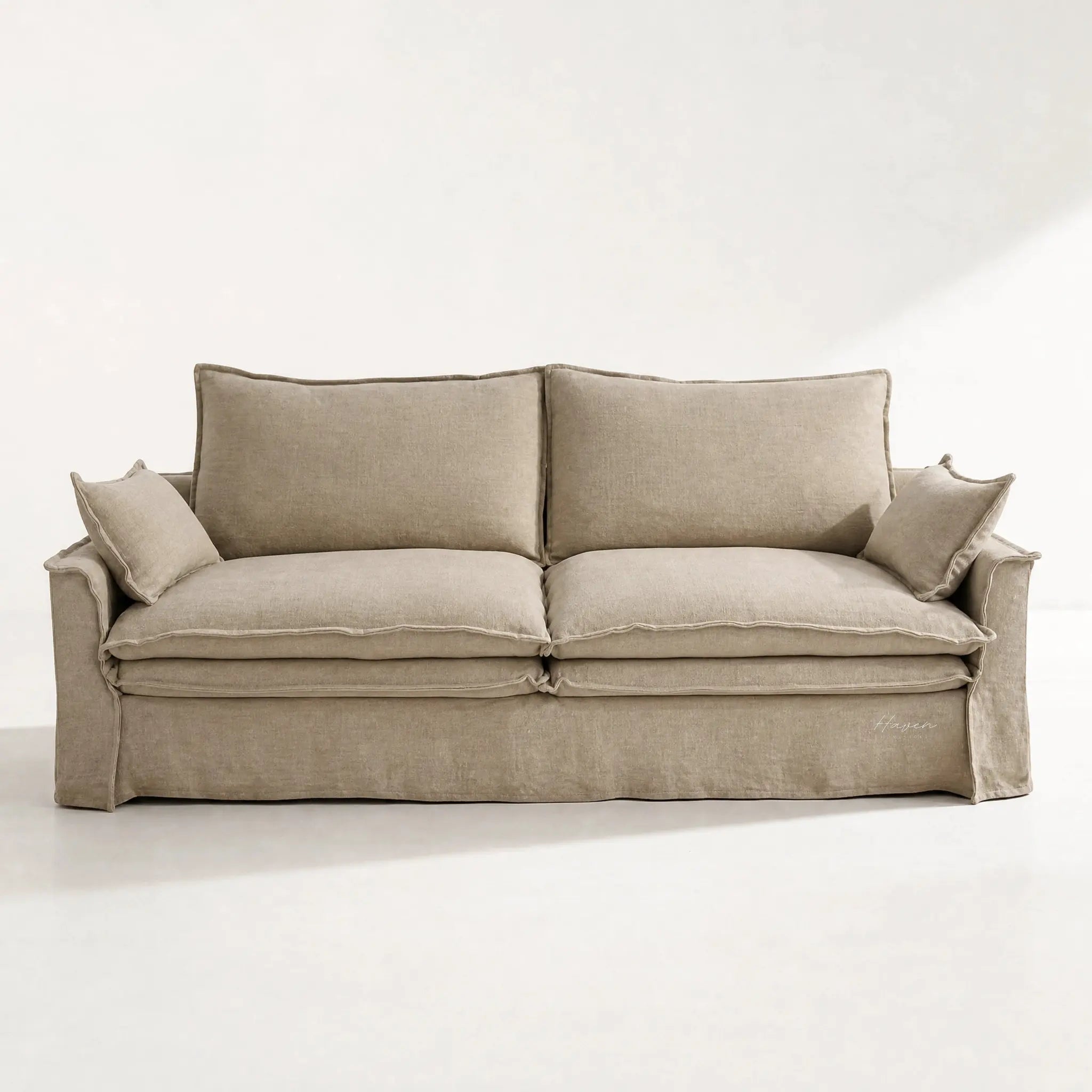 Sorrento 3 Seat Linen Sofa in warm beige linen with feather-filled cushions and a relaxed drape.