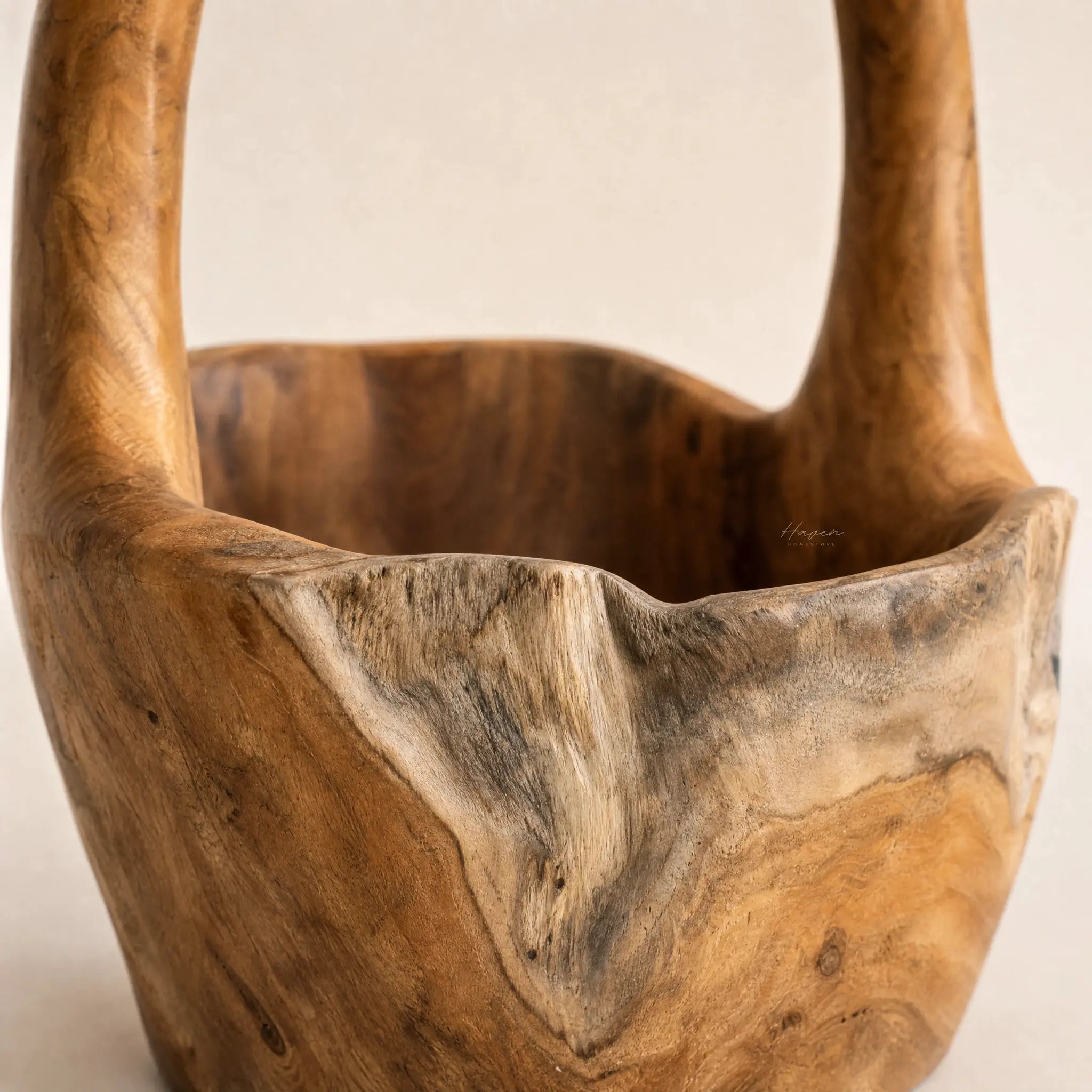 Teak Handle Bowl with sculptural handle detail and warm, organic wood grain.