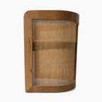 Cove Cane Chair with curved oak frame and woven rattan panels, softly cushioned seat.