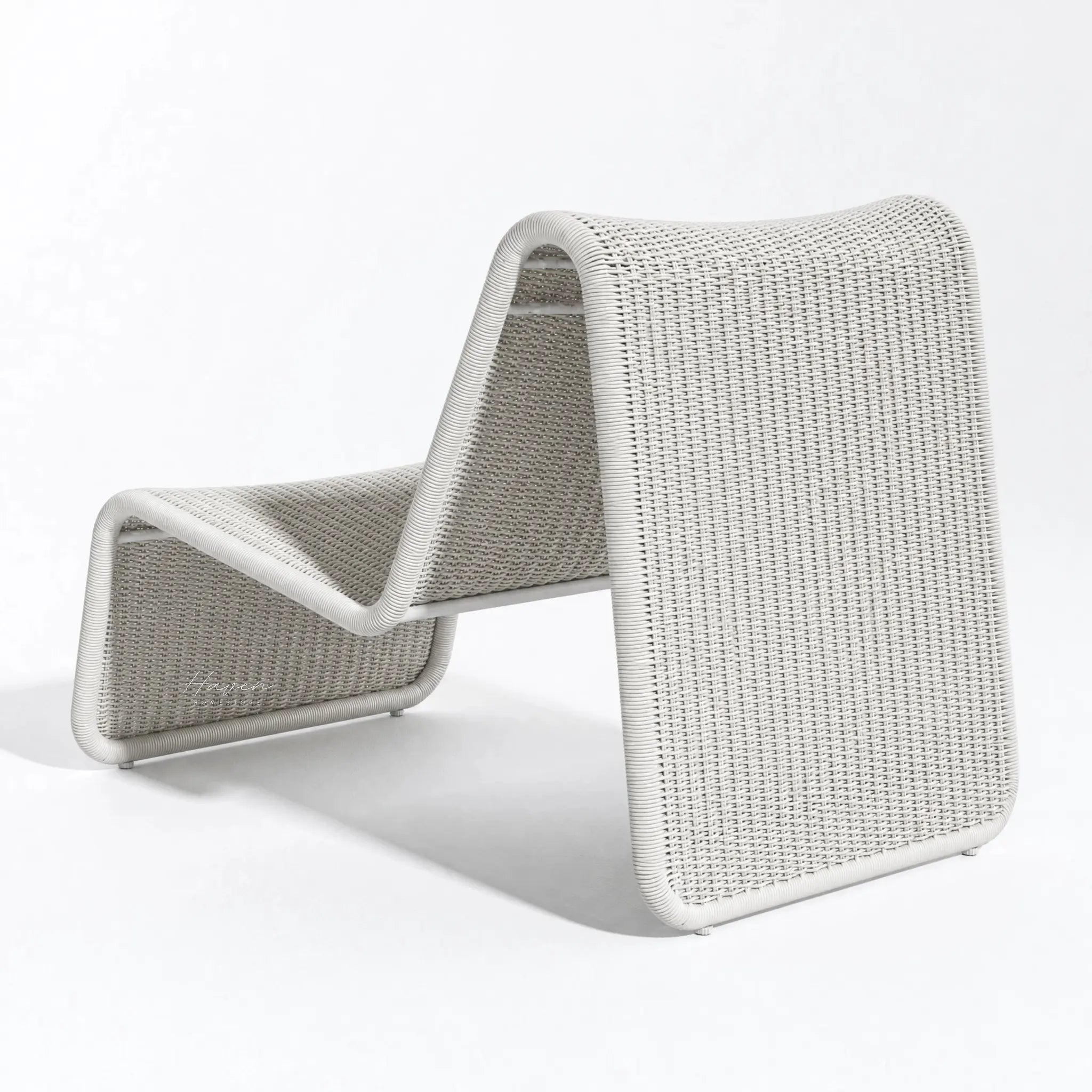 Marina Outdoor Lounge Chair in light gray woven rattan, coastal patio seating.