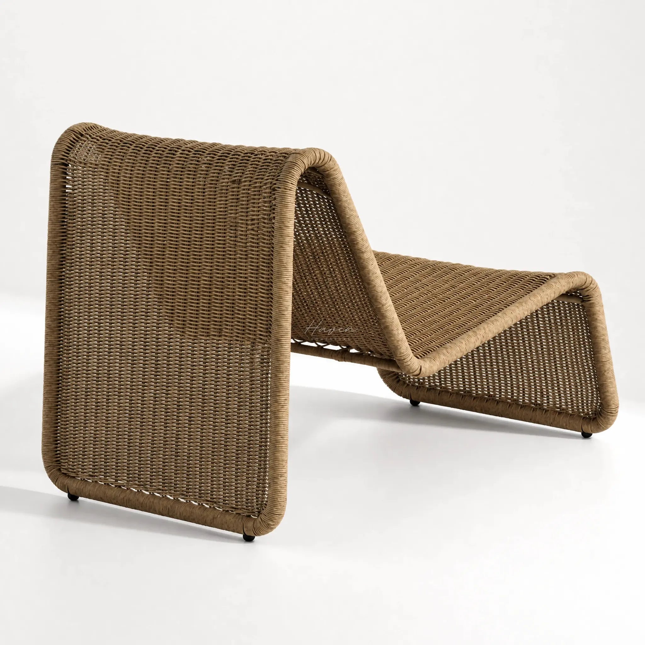 Marina Outdoor Lounge Chair in relaxed woven rattan with a coastal resort vibe for patio, deck, or outdoor spa.