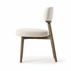 Maison Dining Chair with ash wood frame and beige polyester upholstered seat and backrest.