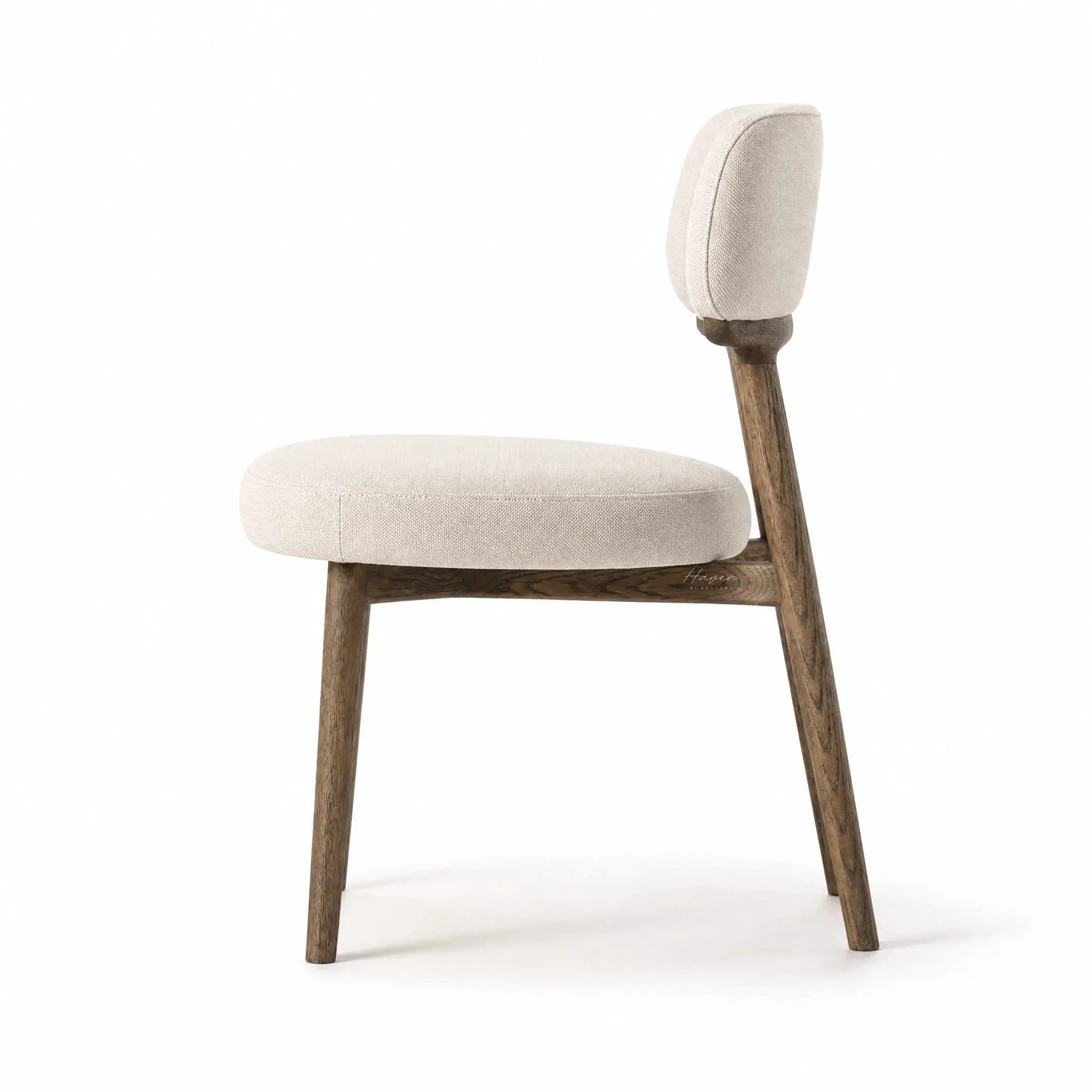 Maison Dining Chair with ash wood frame and beige polyester upholstered seat and backrest.