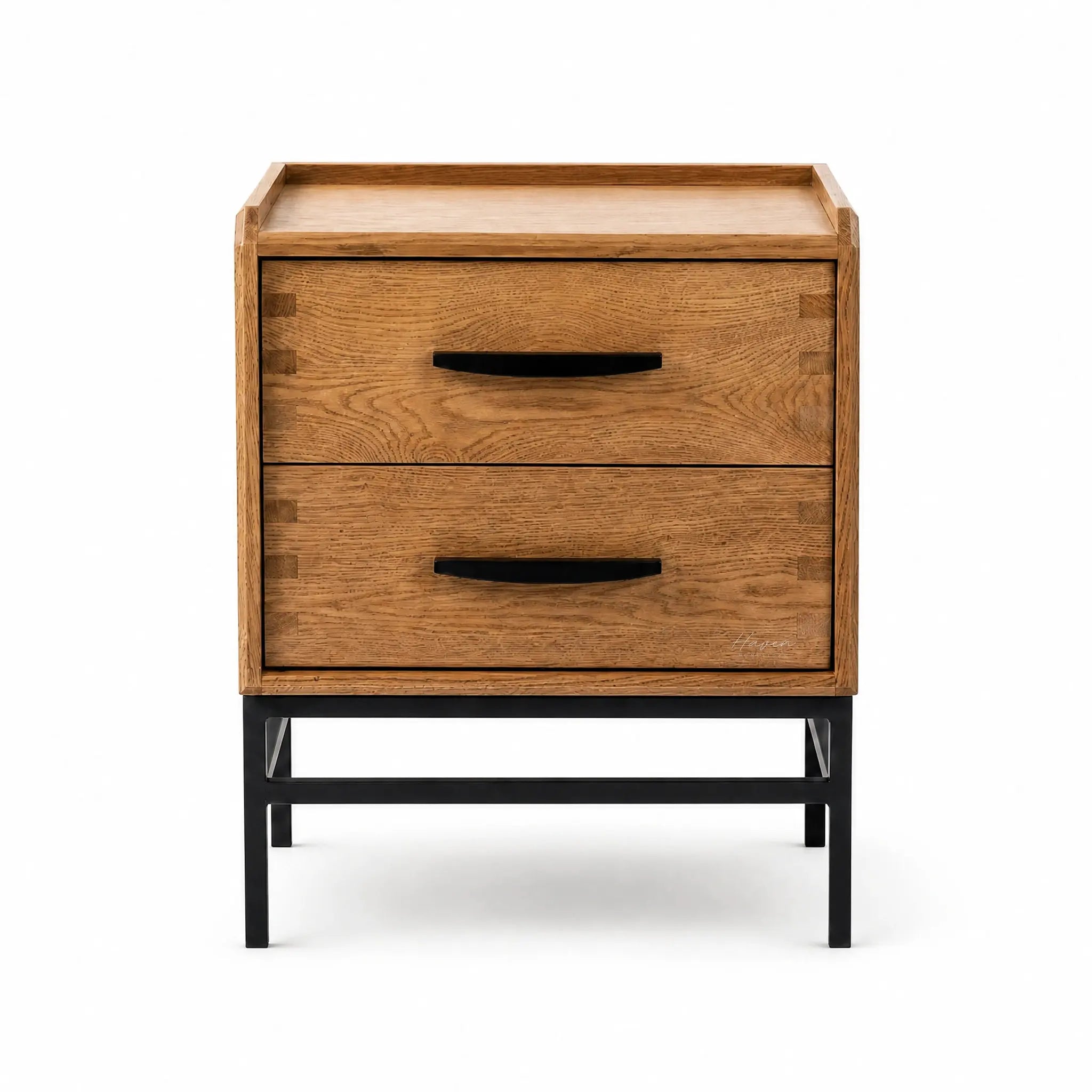Carlton 2-Drawer Bedside Table in oak with black handles on a slim metal base.