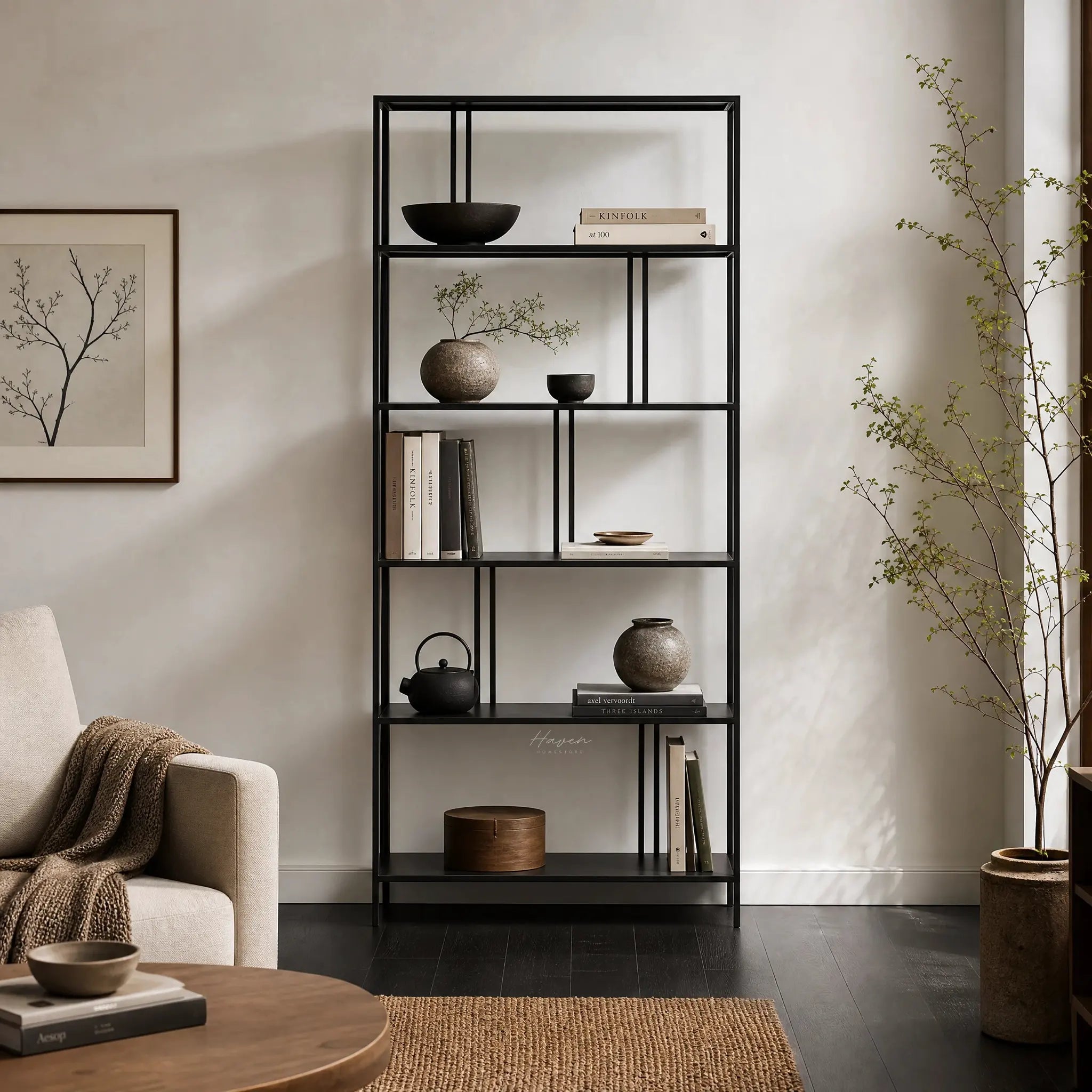 Lorenzo Metal Bookshelf in black powder-coated steel with slim frame, displaying books, bowls, and plants.