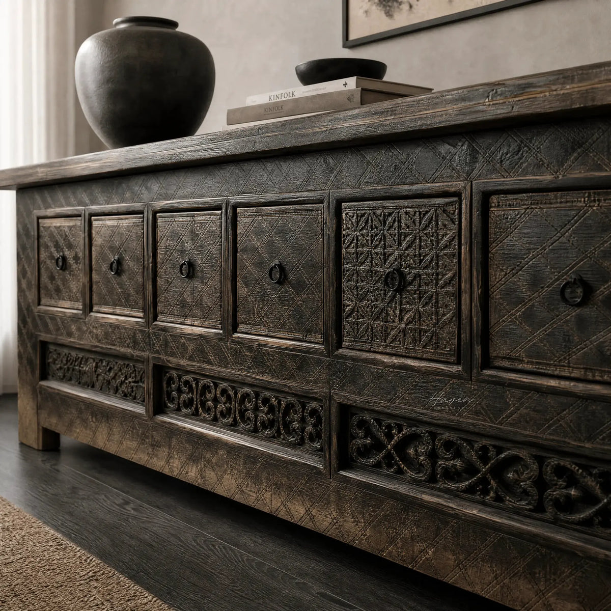 Nomad Coffer Blackened: dark, textured reclaimed pine cabinet with carved geometric panels and warm, moody charm.