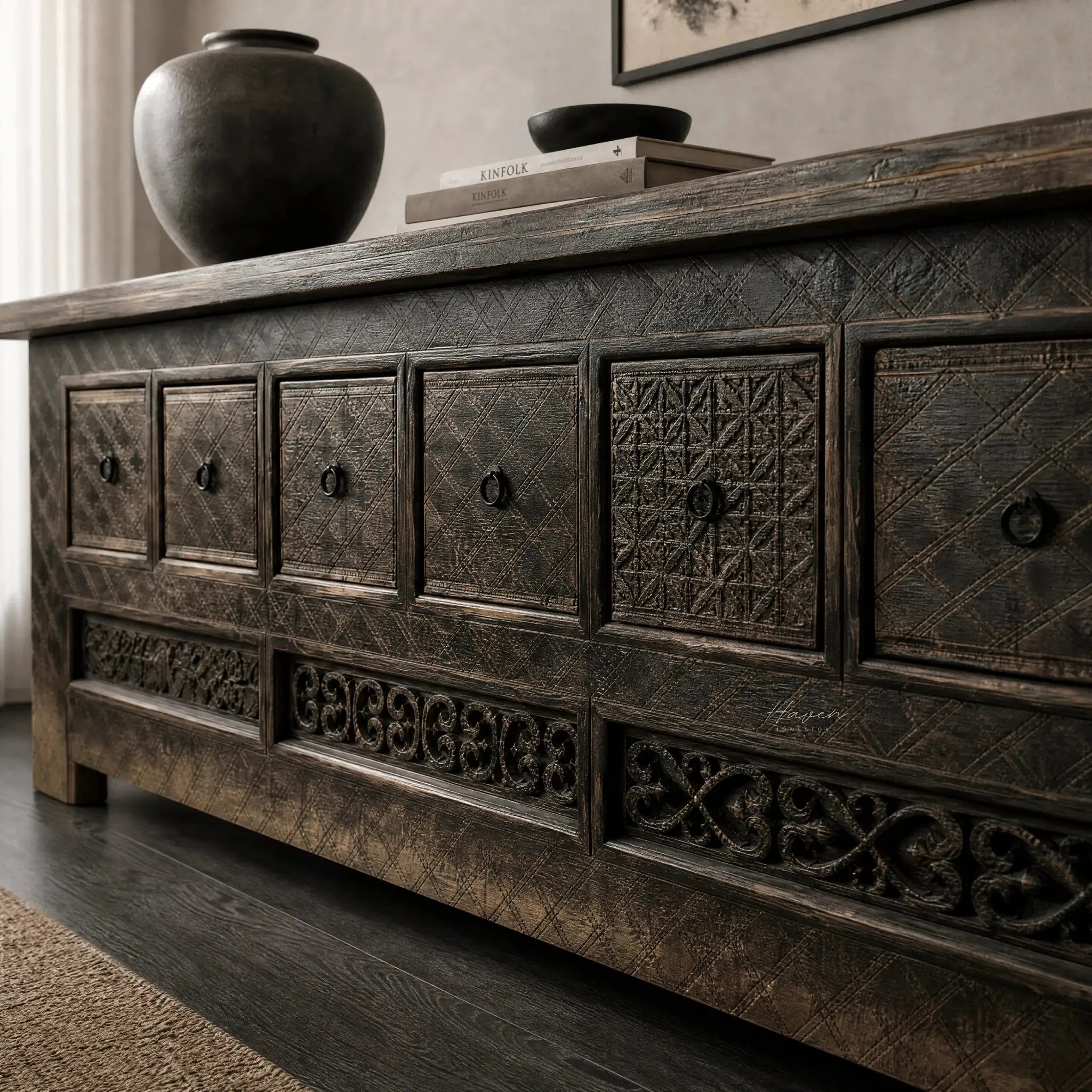 Nomad Coffer Blackened: dark, textured reclaimed pine cabinet with carved geometric panels and warm, moody charm.
