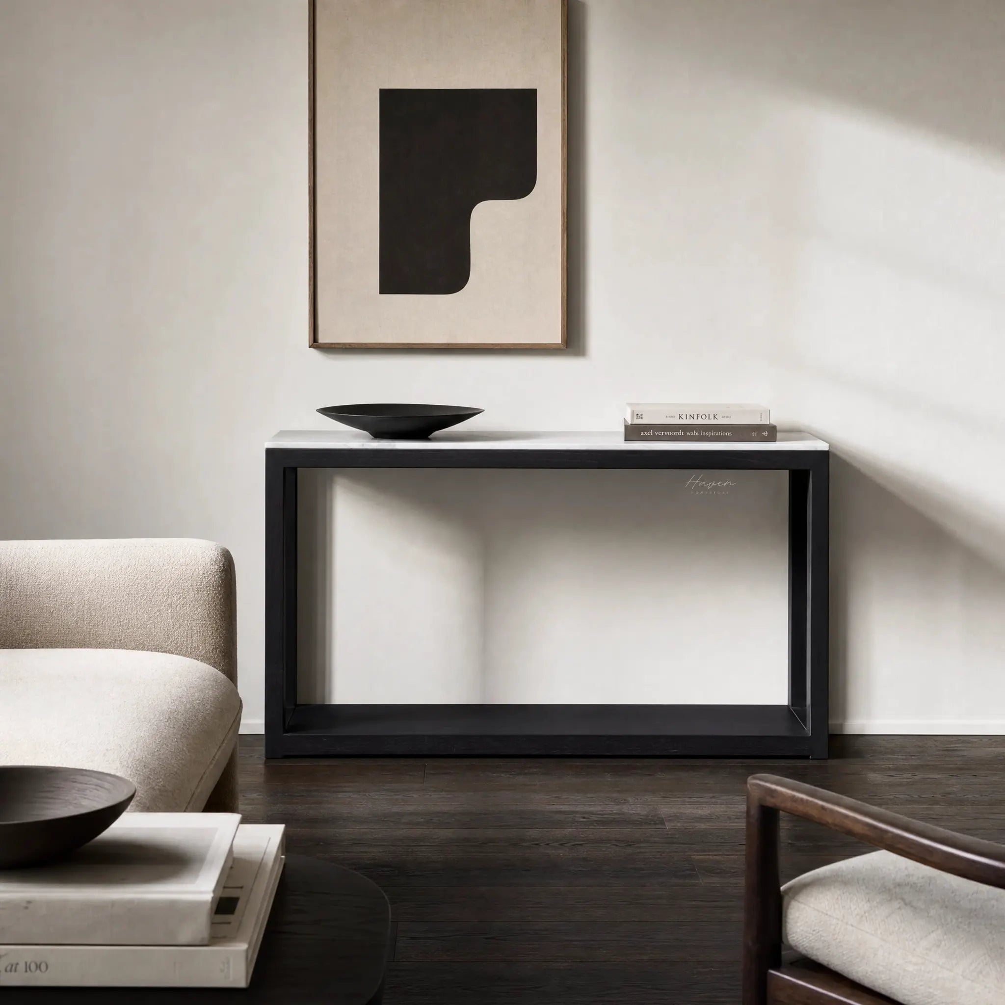 Sable Marble Console with black reclaimed pine base and marble top in a minimalist living room.