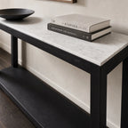 Sable Marble Console: black reclaimed pine base with light marble top, shown with stacked books.