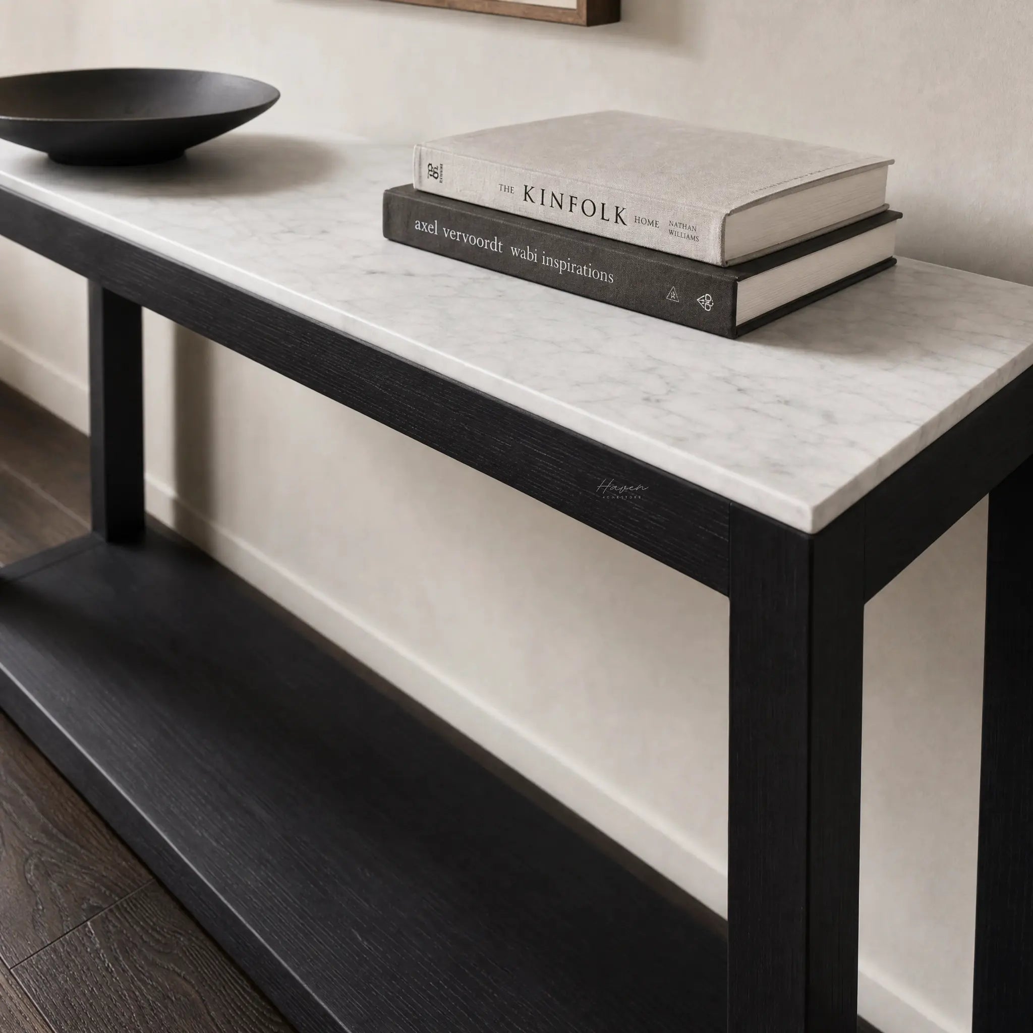 Sable Marble Console: black reclaimed pine base with light marble top, shown with stacked books.