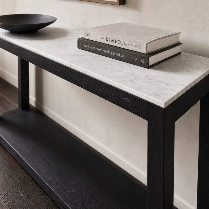 Sable Marble Console: black reclaimed pine base with light marble top, shown with stacked books.