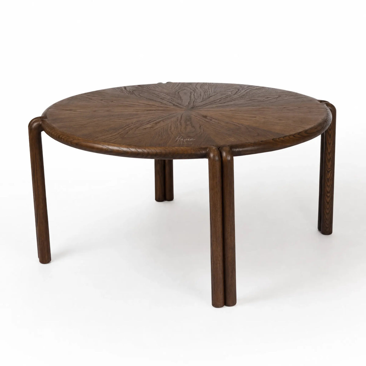 Round Orbit Ash Coffee Table with veneer top and sculptural birch legs in warm timber tones.