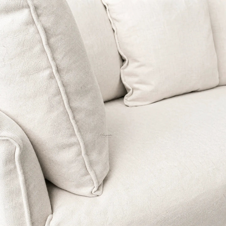 Cove Slipcover Sofa, 3-seat, in soft linen-cotton with generous feather and foam cushions.