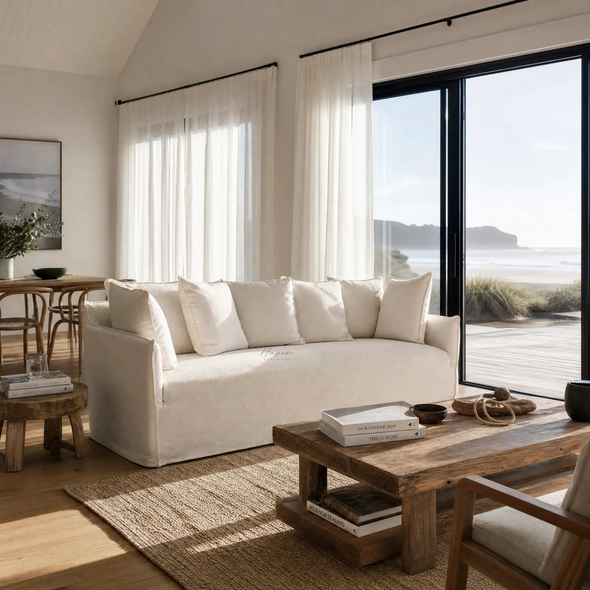 Cove Slipcover Sofa, 3-seat, linen-cotton blend with feather and foam cushions, in a sunlit living room.