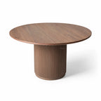 Sora Dining Table - Walnut, with a round top and fluted, ribbed pedestal base.