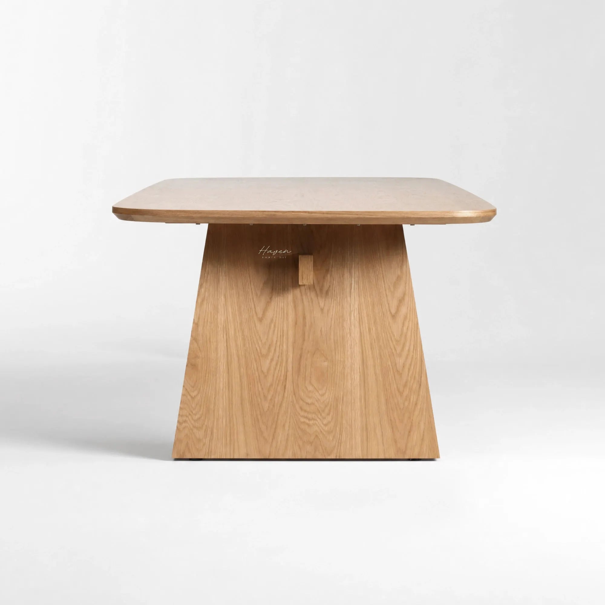 Mikkel Dining Table in natural oak veneer, Nordic design, softly rounded edges, pedestal base.
