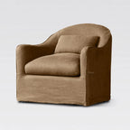 Nella slipcover chair upholstered in warm Mocha linen with a softly curved back and removable cover for a relaxed, lived-in look.