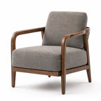 Kiso Chair featuring a deep walnut stained solid ash frame with gracefully curved arms and soft grey restraint upholstery.