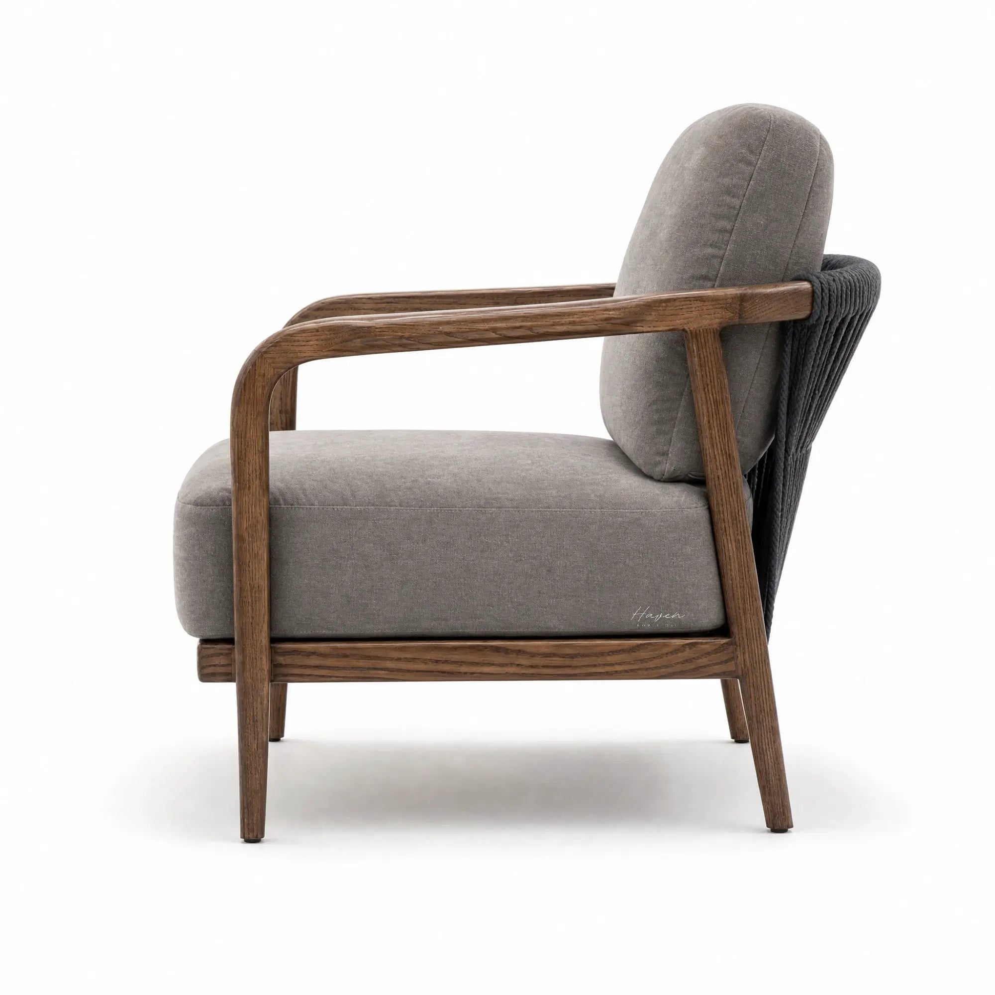 Kiso Chair featuring a deep walnut stain wooden frame, gently curved arms, and soft grey upholstered cushions.