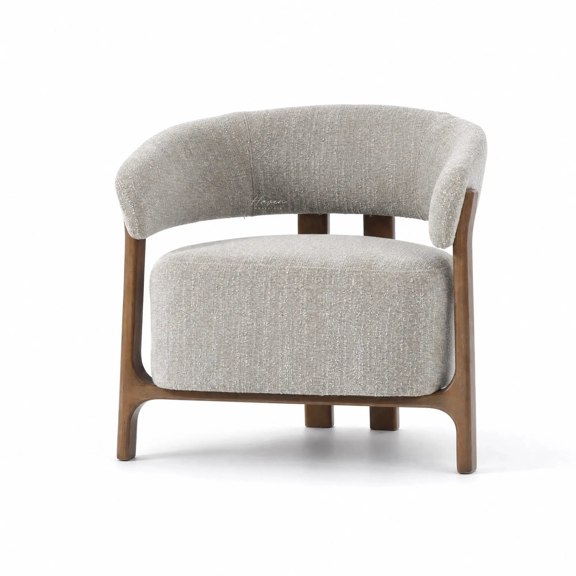SekiChairPumice features soft upholstered form and curved backrest contrasted by a clean exposed timber ash frame structure.