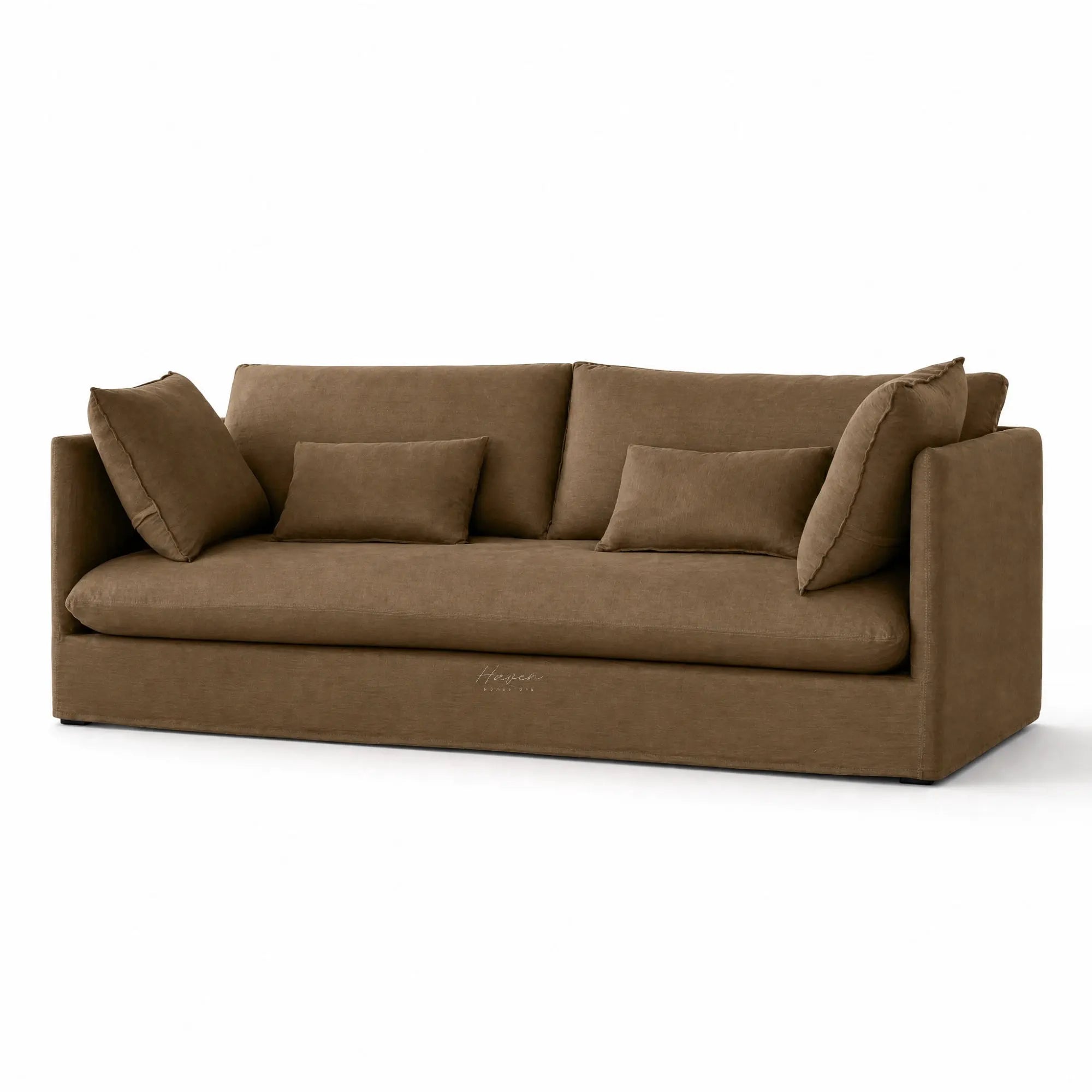 Nella slipcover sofa in mocha linen featuring a relaxed low-set silhouette, generous loose cushions, and a tailored 100% linen cover.