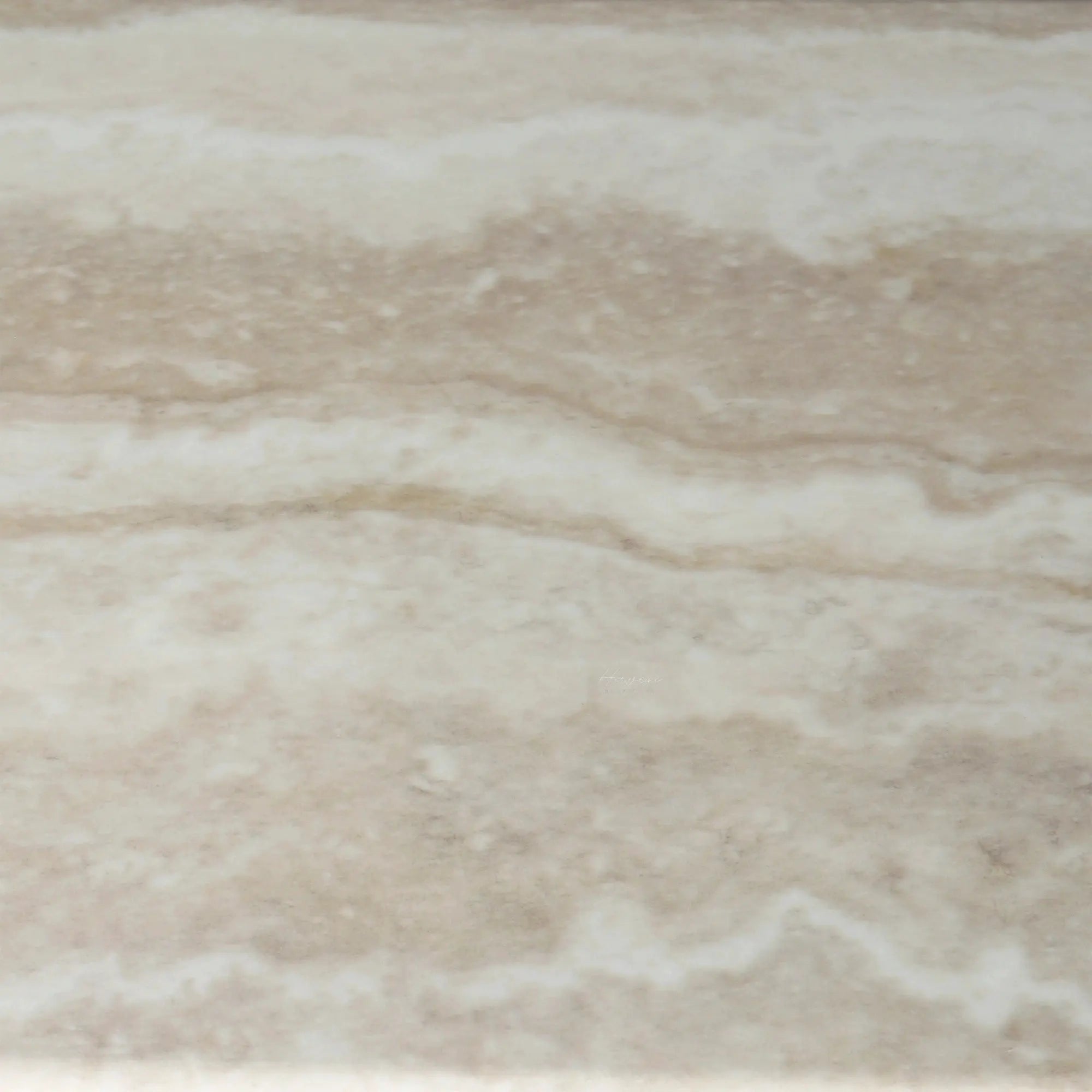 Close-up of Aalto Dining Table faux marble top showing pale stone-look surface with subtle horizontal veining and tonal variation.