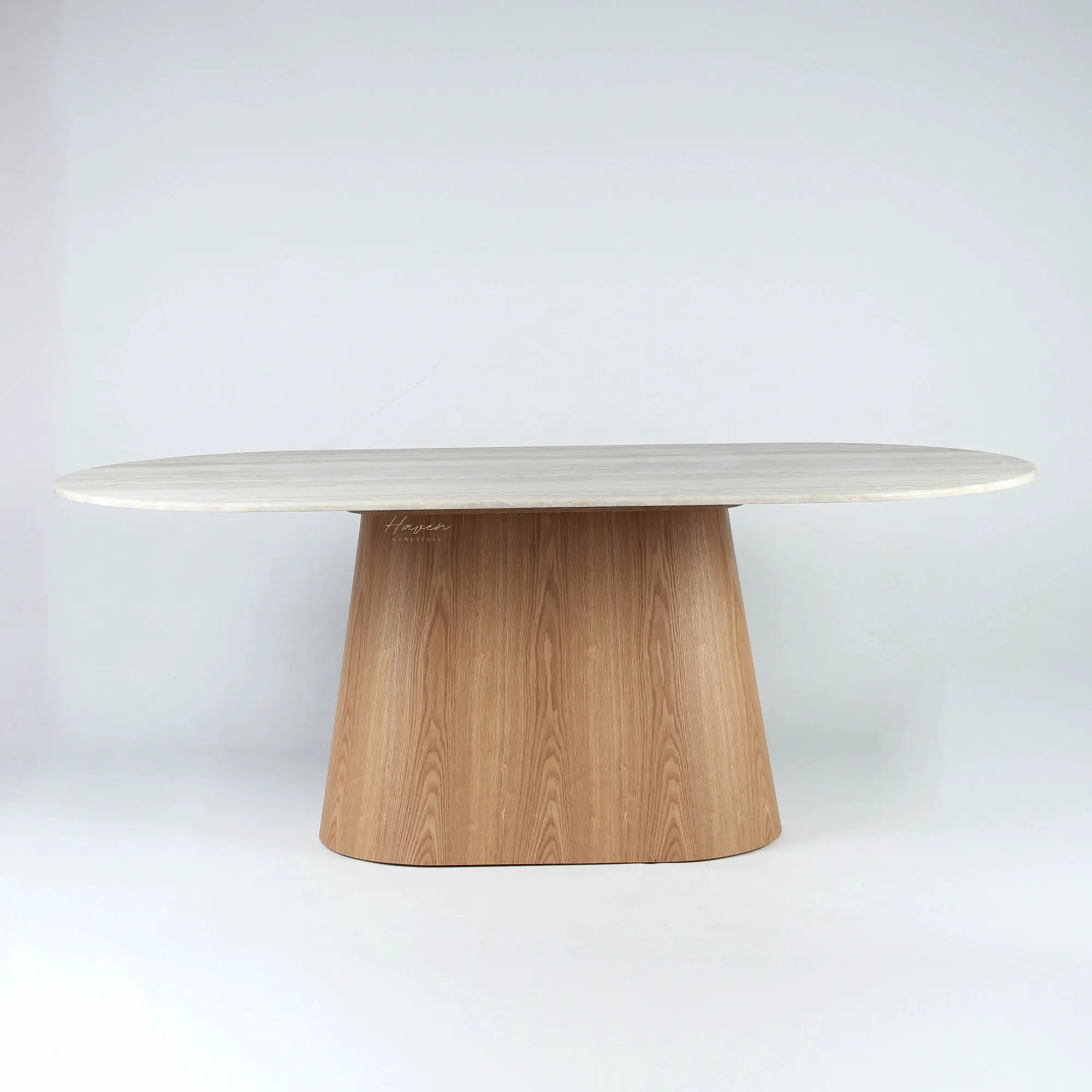 Oval Aalto dining table with rounded faux marble top and tapered wooden pedestal base, featuring a sculptural modernist silhouette.