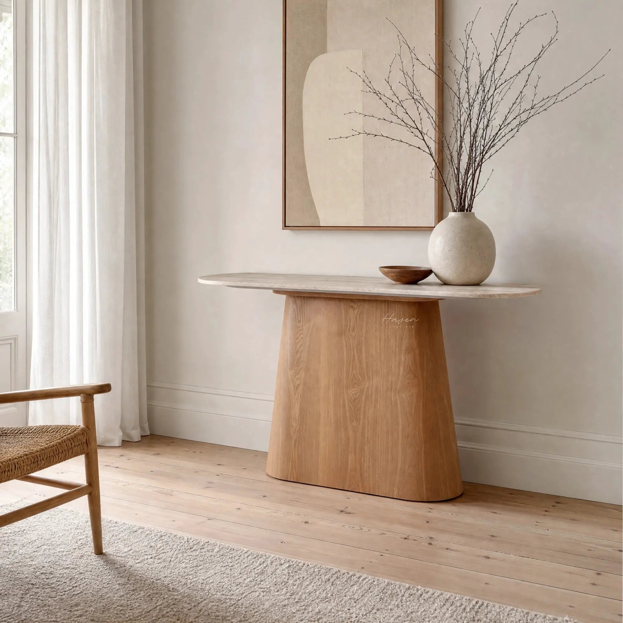 Aalto Console with rounded faux-marble top and sculptural oak-toned veneer base in a serene, minimalist room.