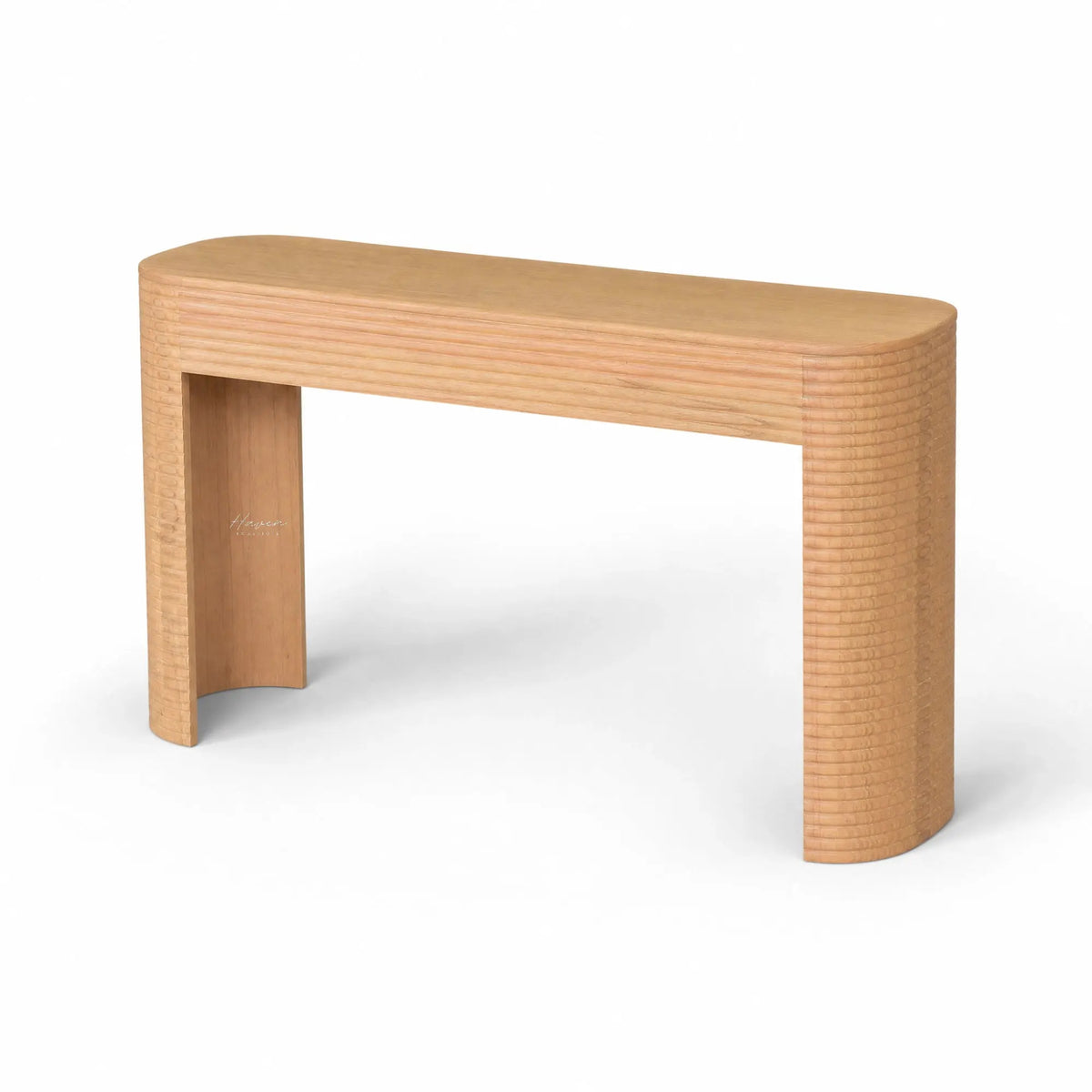 Elva Console in mindi timber with softly rounded silhouette and linear carved detailing.