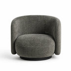 Textured moss green swivel chair with a rounded, enveloping back, soft cushion, and dark circular base.