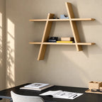 Oiled oak A-frame wall shelf with geometric design and visible grain, holding office supplies above a black desk.