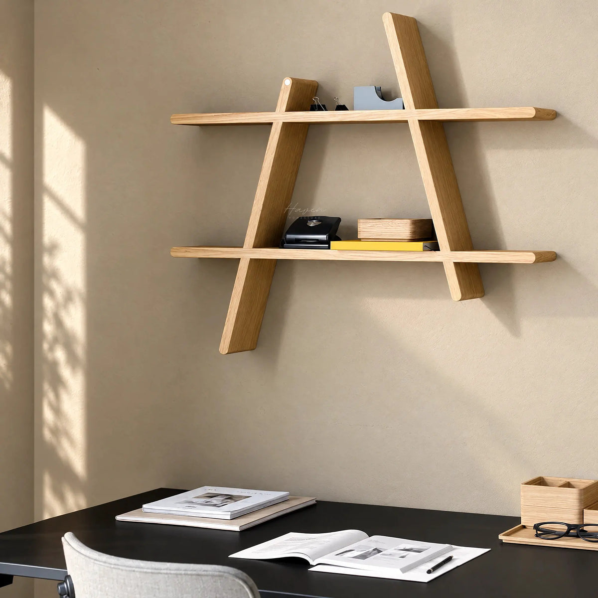 Oiled oak A-frame wall shelf with geometric design and visible grain, holding office supplies above a black desk.