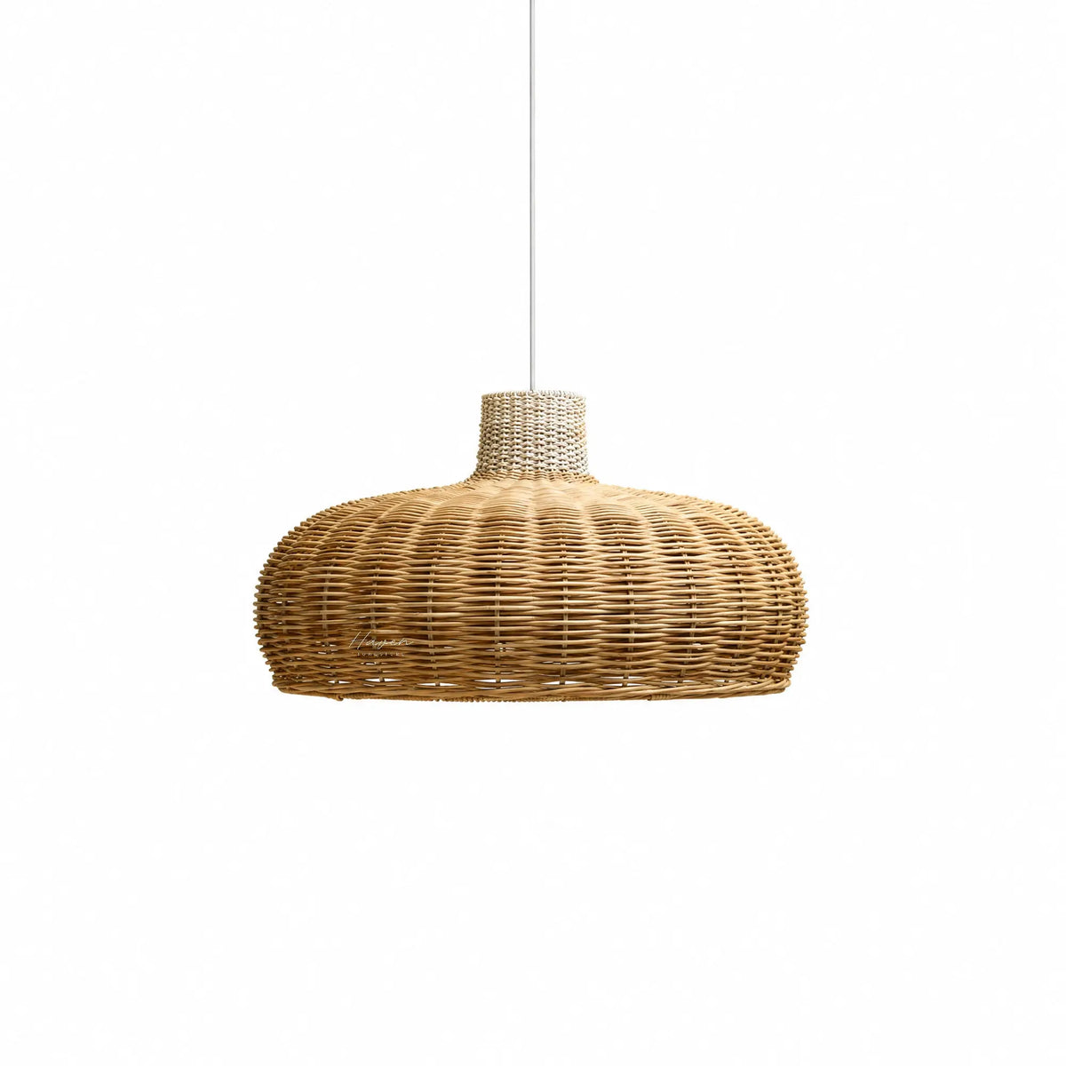 Dalat pendant light featuring a low, domed profile and handwoven peeled rattan with an open texture and natural fiber variation.