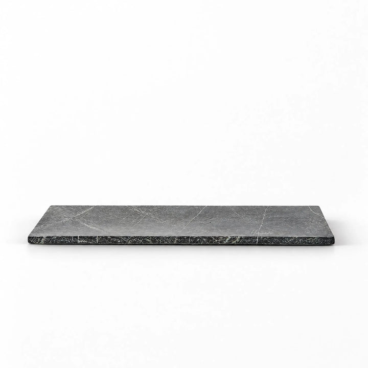 Long rectangular green marble tray featuring fine white veining and a linear, minimalist design against a white background.