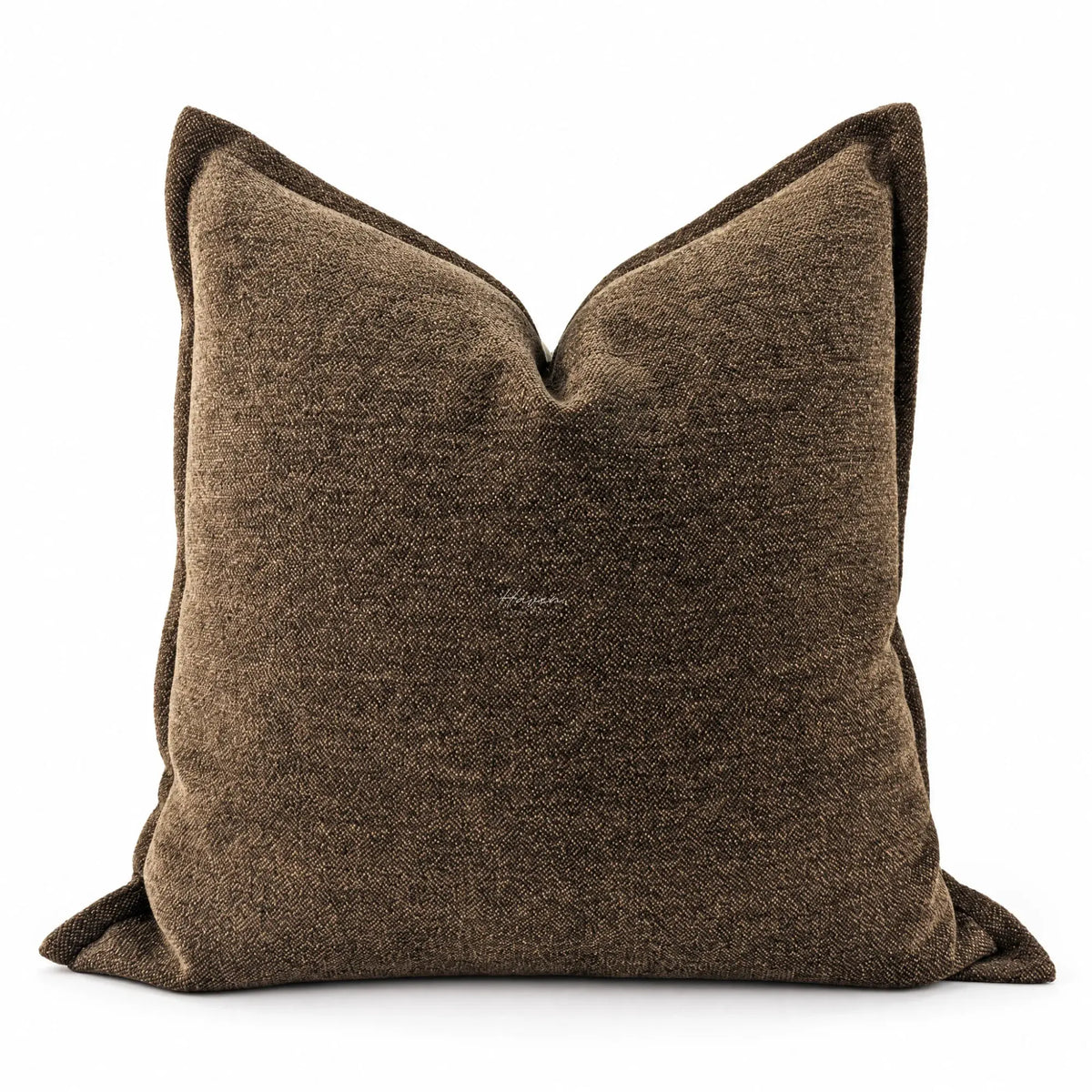 Softly textured cocoa cushion cover with subtle tonal variation and relaxed square shape.