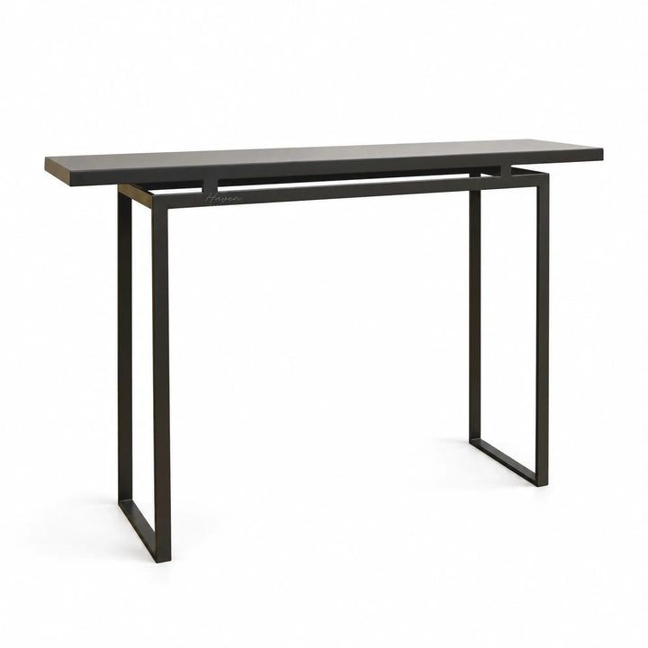 Modern greyed-brown console table with a slim metal architectural frame and elongated top.